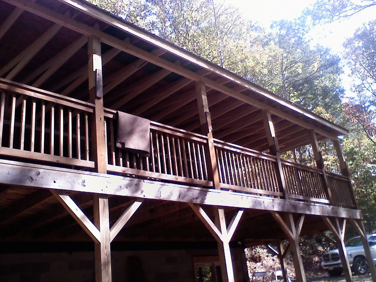 Timber framing under a new elevated porch and deck — Roof Leak Repair in Le Mars by Roofing Brothers
